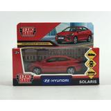 Машина металл HYUNDAI SOLARIS длина 12 см, двер, багаж, инерц, красный, кор. Технопарк 